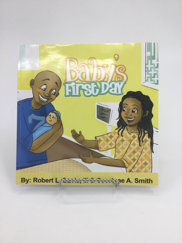 Baby's First Day Paperback Book
