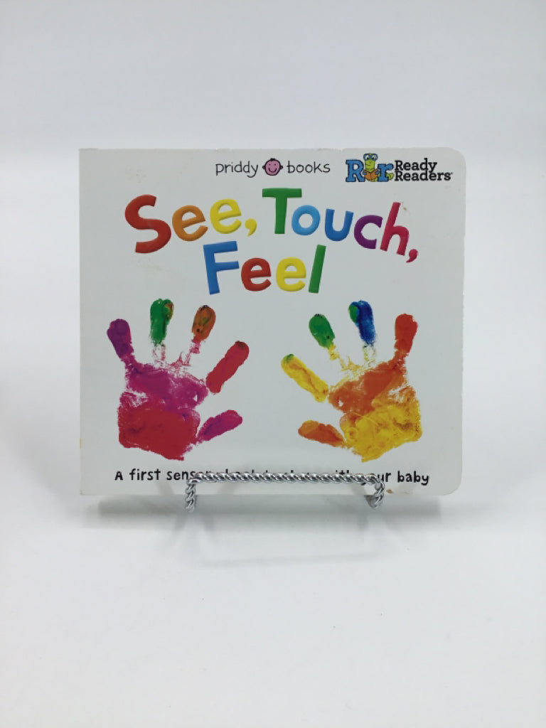 See, Touch, Feel Board Book