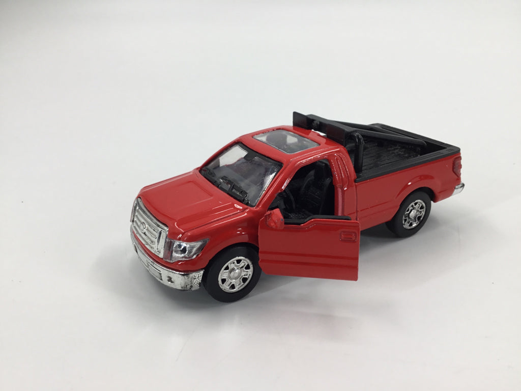Die-cast Red 2010 Ford F-150 STX Model Pick-up Truck