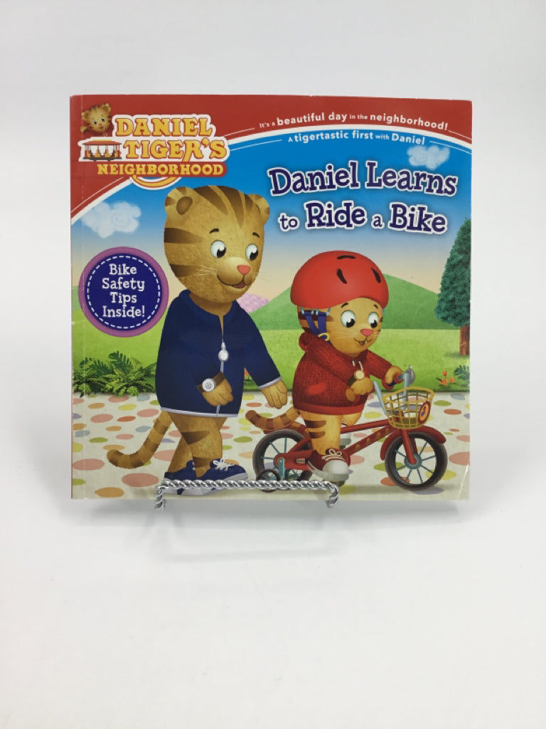 Daniel Tiger's Neighborhood Daniel Learns to Ride a Bike Paper Back Book