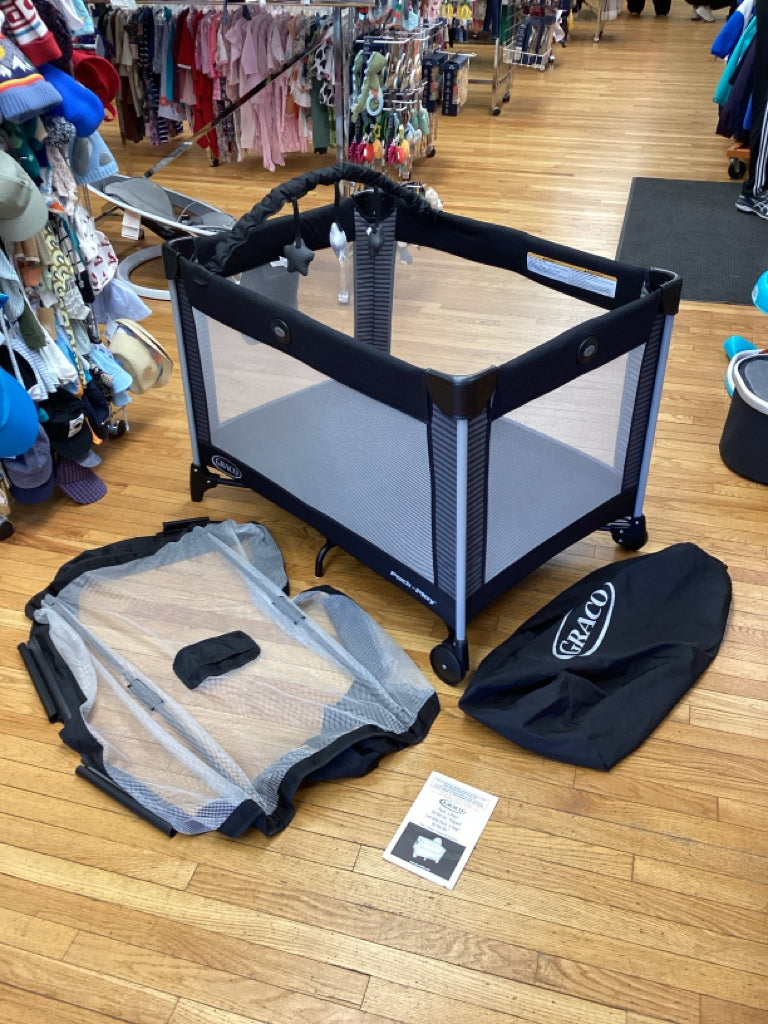 Graco Black Pack n' Play with Toy Bar