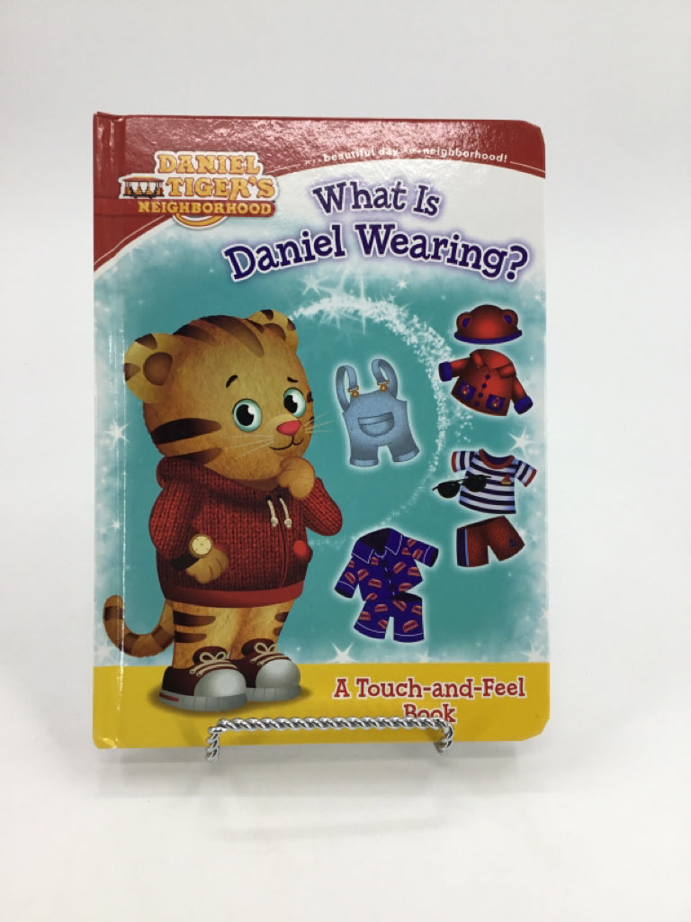 What is Daniel Wearing? a touch-and-Feel Board Book