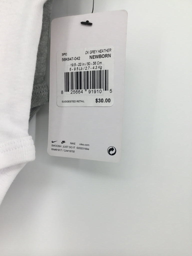 Nike Child Size Newborn White Onesie