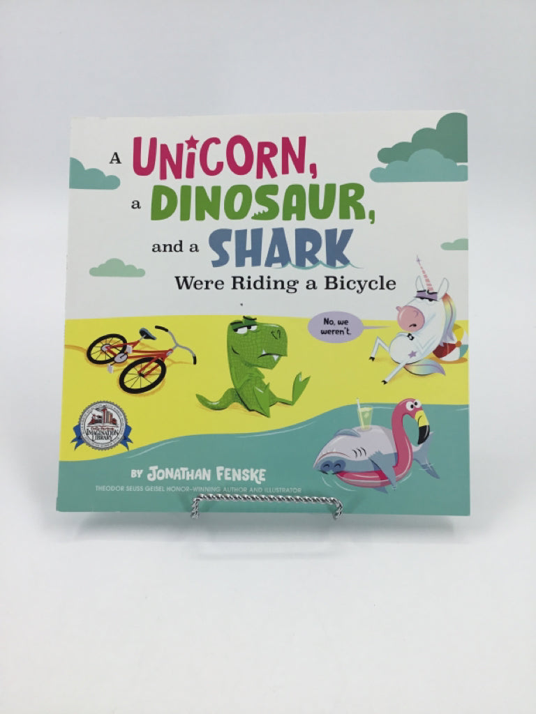 A Unicorn, a Dinosaur, and a Shark Were Riding a Bicycle Paper Back Book