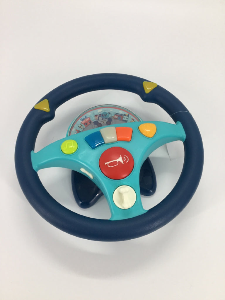 B. Toys Woofer'S Musical Driving Wheel