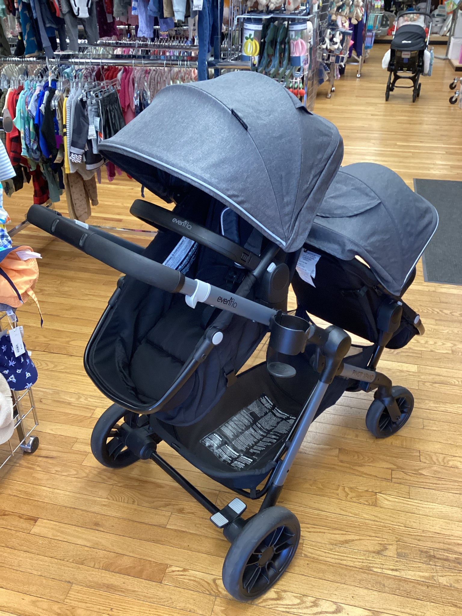 Evenflo Pivot Double Stroller with seat the converts to a bassinet